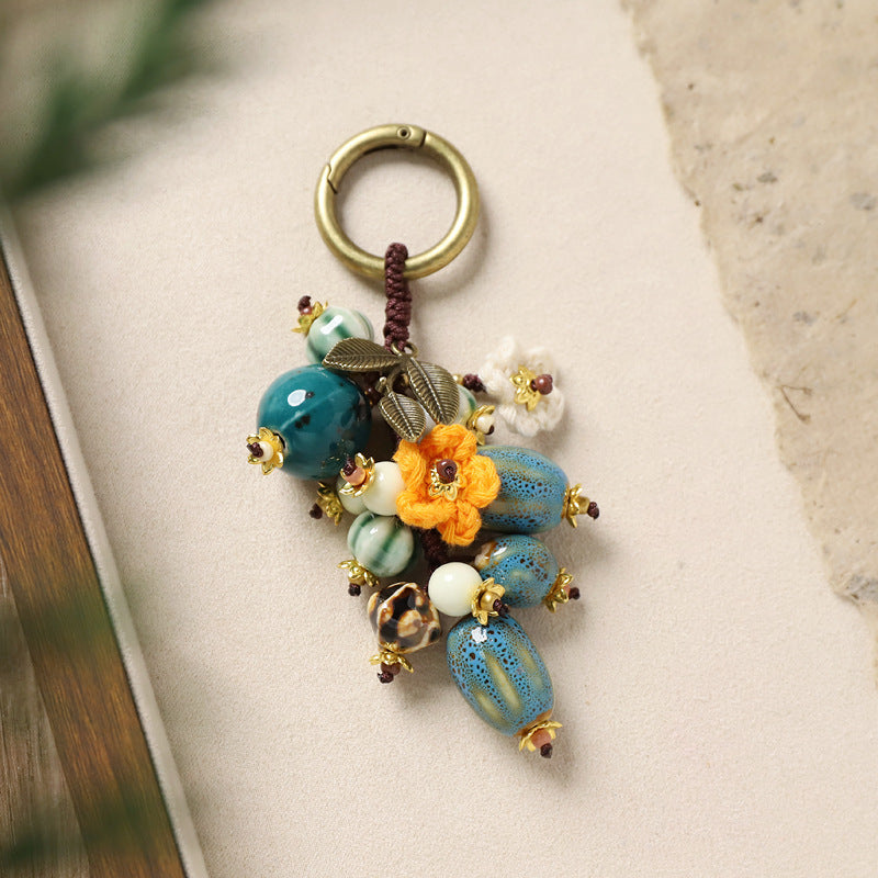 Pomegranate Ceramic Bag Charm – Handmade Woven Keychain