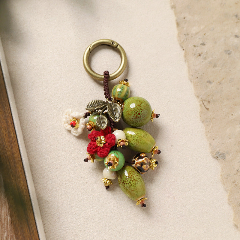 Pomegranate Ceramic Bag Charm – Handmade Woven Keychain